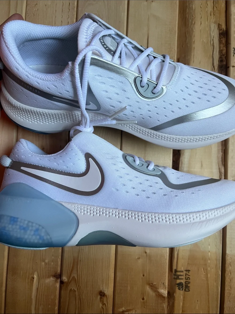 Nike Women’s White with Light Blue Accent Running Shoes